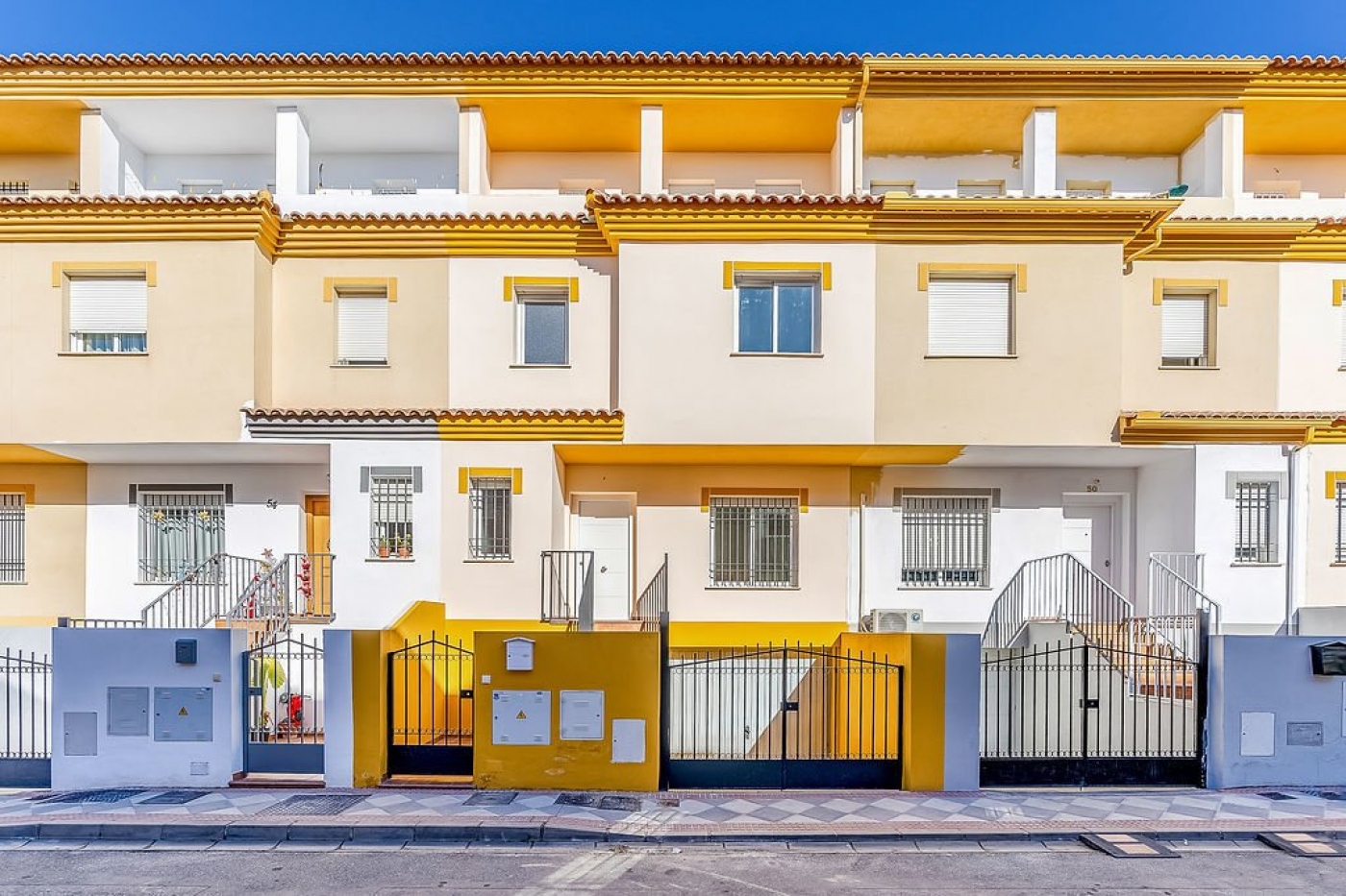 Promoción de chalets adosados en Atarfe, Granada