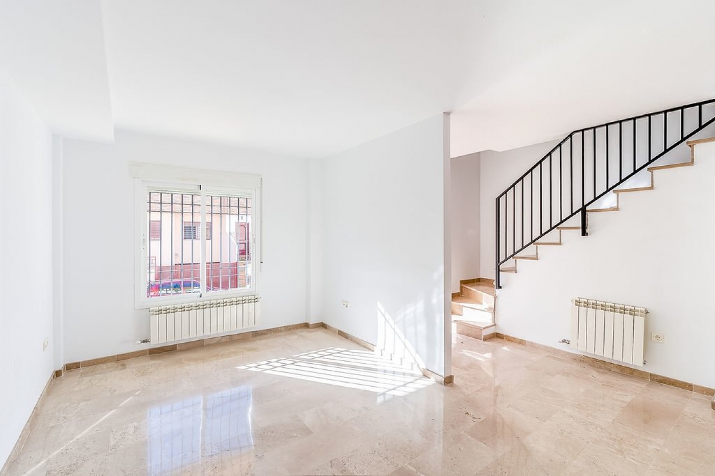 Promoción de chalets adosados en Atarfe, Granada