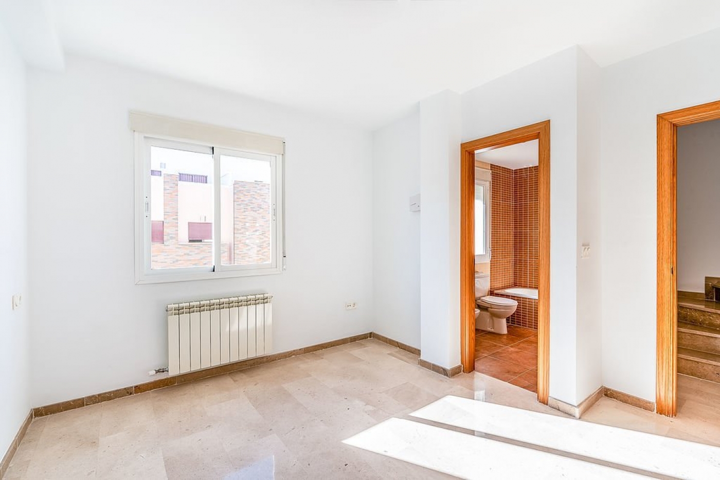 Promoción de chalets adosados en Atarfe, Granada