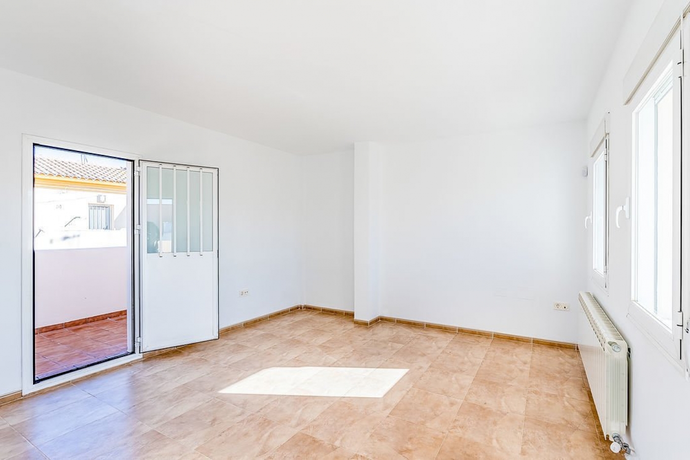 Promoción de chalets adosados en Atarfe, Granada