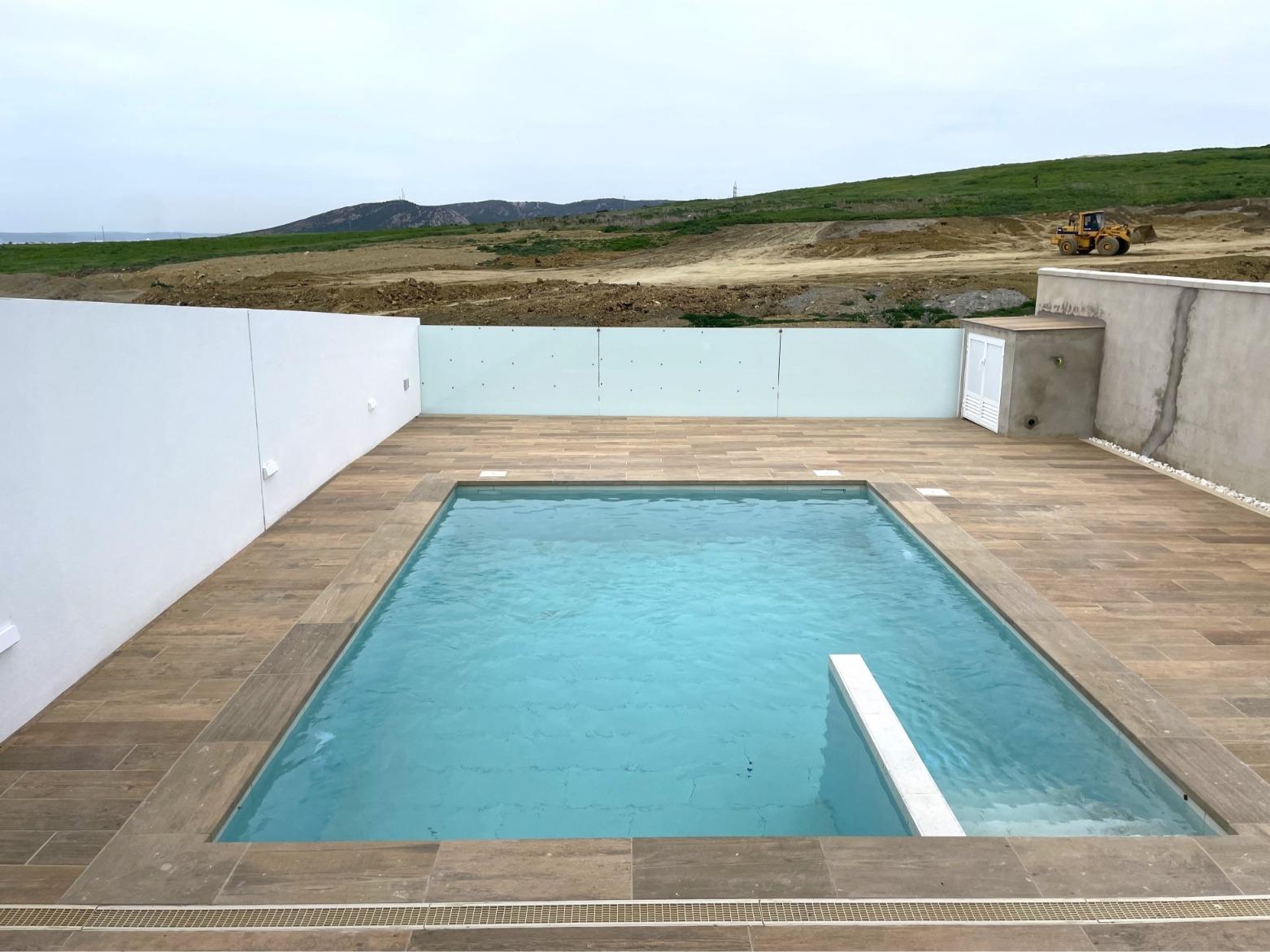 Vivienda a estrenar con piscina privada en Atlanterra